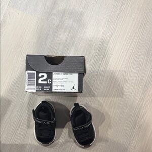 Jordan Kids Black and White Sneakers